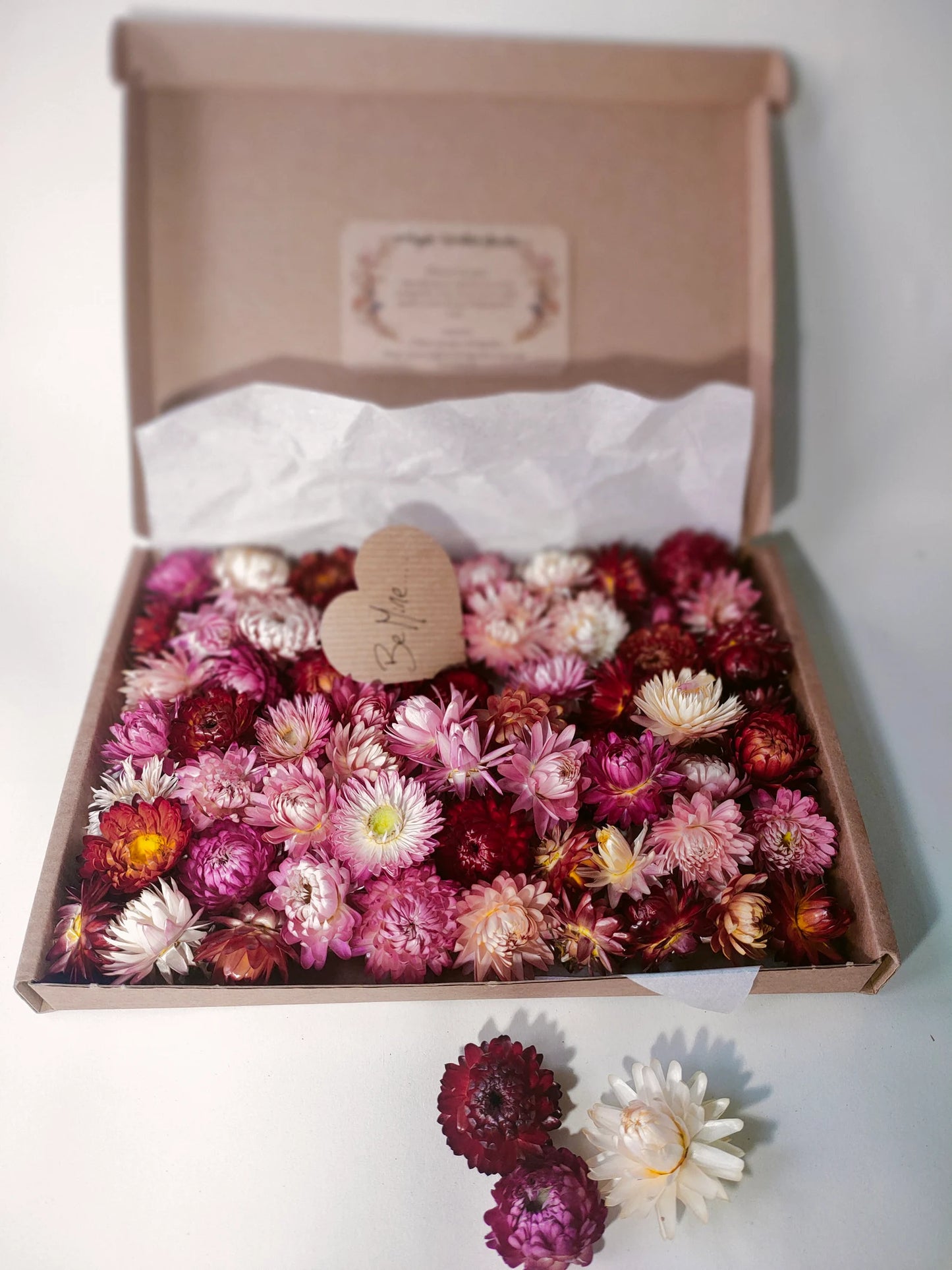 Box of pink dried flower heads
